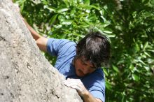 Javier Morales leading Nose Print on the Windshield (5.11c), shot from the top of Ack! (5.11b, but using the crack for the start instead) that I top roped up with my camera on my back.  It was another long day of rock climbing at Seismic Wall on Austin's Barton Creek Greenbelt, Sunday, April 5, 2009.

Filename: SRM_20090405_13335378.jpg
Aperture: f/8.0
Shutter Speed: 1/500
Body: Canon EOS-1D Mark II
Lens: Canon EF 80-200mm f/2.8 L