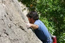 Javier Morales leading Nose Print on the Windshield (5.11c), shot from the top of Ack! (5.11b, but using the crack for the start instead) that I top roped up with my camera on my back.  It was another long day of rock climbing at Seismic Wall on Austin's Barton Creek Greenbelt, Sunday, April 5, 2009.

Filename: SRM_20090405_13335882.jpg
Aperture: f/9.0
Shutter Speed: 1/500
Body: Canon EOS-1D Mark II
Lens: Canon EF 80-200mm f/2.8 L