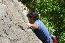 Javier Morales leading Nose Print on the Windshield (5.11c), shot from the top of Ack! (5.11b, but using the crack for the start instead) that I top roped up with my camera on my back.  It was another long day of rock climbing at Seismic Wall on Austin's Barton Creek Greenbelt, Sunday, April 5, 2009.

Filename: SRM_20090405_13335882.jpg
Aperture: f/9.0
Shutter Speed: 1/500
Body: Canon EOS-1D Mark II
Lens: Canon EF 80-200mm f/2.8 L