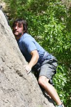 Javier Morales leading Nose Print on the Windshield (5.11c), shot from the top of Ack! (5.11b, but using the crack for the start instead) that I top roped up with my camera on my back.  It was another long day of rock climbing at Seismic Wall on Austin's Barton Creek Greenbelt, Sunday, April 5, 2009.

Filename: SRM_20090405_13371512.jpg
Aperture: f/7.1
Shutter Speed: 1/500
Body: Canon EOS-1D Mark II
Lens: Canon EF 80-200mm f/2.8 L