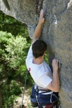 Me top roping Lick the Window (5.10c), shot (by Andrew Dreher) from the top of Ack! (5.11b, but using the crack for the start instead) that I top roped up with my camera on my back.  It was another long day of rock climbing at Seismic Wall on Austin's Barton Creek Greenbelt, Sunday, April 5, 2009.

Filename: SRM_20090405_14420867.jpg
Aperture: f/5.0
Shutter Speed: 1/500
Body: Canon EOS-1D Mark II
Lens: Canon EF 80-200mm f/2.8 L