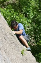 Javier Morales leading Nose Print on the Windshield (5.11c), shot from the top of Ack! (5.11b, but using the crack for the start instead) that I top roped up with my camera on my back.  It was another long day of rock climbing at Seismic Wall on Austin's Barton Creek Greenbelt, Sunday, April 5, 2009.

Filename: SRM_20090405_14561885.jpg
Aperture: f/8.0
Shutter Speed: 1/500
Body: Canon EOS-1D Mark II
Lens: Canon EF 80-200mm f/2.8 L