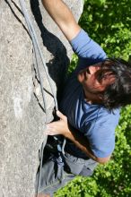 Javier Morales top rope climbing She's No Dog, She's My Wife (5.11b), shot from the top of Ack! (5.11b, but using the crack for the start instead) that I top roped up with my camera on my back.  It was another long day of rock climbing at Seismic Wall on Austin's Barton Creek Greenbelt, Sunday, April 5, 2009.

Filename: SRM_20090405_16173615.jpg
Aperture: f/9.0
Shutter Speed: 1/500
Body: Canon EOS-1D Mark II
Lens: Canon EF 80-200mm f/2.8 L