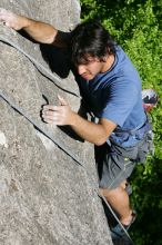 Javier Morales top rope climbing She's No Dog, She's My Wife (5.11b), shot from the top of Ack! (5.11b, but using the crack for the start instead) that I top roped up with my camera on my back.  It was another long day of rock climbing at Seismic Wall on Austin's Barton Creek Greenbelt, Sunday, April 5, 2009.

Filename: SRM_20090405_16482754.jpg
Aperture: f/8.0
Shutter Speed: 1/500
Body: Canon EOS-1D Mark II
Lens: Canon EF 80-200mm f/2.8 L