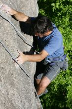 Javier Morales top rope climbing She's No Dog, She's My Wife (5.11b), shot from the top of Ack! (5.11b, but using the crack for the start instead) that I top roped up with my camera on my back.  It was another long day of rock climbing at Seismic Wall on Austin's Barton Creek Greenbelt, Sunday, April 5, 2009.

Filename: SRM_20090405_16483155.jpg
Aperture: f/8.0
Shutter Speed: 1/500
Body: Canon EOS-1D Mark II
Lens: Canon EF 80-200mm f/2.8 L