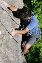 Javier Morales top rope climbing She's No Dog, She's My Wife (5.11b), shot from the top of Ack! (5.11b, but using the crack for the start instead) that I top roped up with my camera on my back.  It was another long day of rock climbing at Seismic Wall on Austin's Barton Creek Greenbelt, Sunday, April 5, 2009.

Filename: SRM_20090405_16483156.jpg
Aperture: f/8.0
Shutter Speed: 1/500
Body: Canon EOS-1D Mark II
Lens: Canon EF 80-200mm f/2.8 L