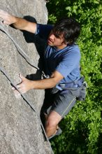 Javier Morales top rope climbing She's No Dog, She's My Wife (5.11b), shot from the top of Ack! (5.11b, but using the crack for the start instead) that I top roped up with my camera on my back.  It was another long day of rock climbing at Seismic Wall on Austin's Barton Creek Greenbelt, Sunday, April 5, 2009.

Filename: SRM_20090405_16483357.jpg
Aperture: f/8.0
Shutter Speed: 1/500
Body: Canon EOS-1D Mark II
Lens: Canon EF 80-200mm f/2.8 L