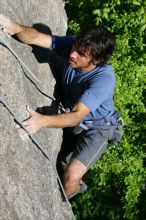 Javier Morales top rope climbing She's No Dog, She's My Wife (5.11b), shot from the top of Ack! (5.11b, but using the crack for the start instead) that I top roped up with my camera on my back.  It was another long day of rock climbing at Seismic Wall on Austin's Barton Creek Greenbelt, Sunday, April 5, 2009.

Filename: SRM_20090405_16483358.jpg
Aperture: f/8.0
Shutter Speed: 1/500
Body: Canon EOS-1D Mark II
Lens: Canon EF 80-200mm f/2.8 L