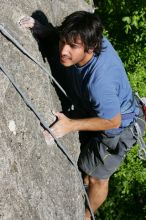 Javier Morales top rope climbing She's No Dog, She's My Wife (5.11b), shot from the top of Ack! (5.11b, but using the crack for the start instead) that I top roped up with my camera on my back.  It was another long day of rock climbing at Seismic Wall on Austin's Barton Creek Greenbelt, Sunday, April 5, 2009.

Filename: SRM_20090405_16483459.jpg
Aperture: f/9.0
Shutter Speed: 1/500
Body: Canon EOS-1D Mark II
Lens: Canon EF 80-200mm f/2.8 L