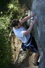 Me top roping Lick the Window (5.10c), shot by Javier Morales from the top of Ack! (5.11b, but using the crack for the start instead) that I top roped up with my camera on my back.  It was another long day of rock climbing at Seismic Wall on Austin's Barton Creek Greenbelt, Sunday, April 5, 2009.

Filename: SRM_20090405_17281220.jpg
Aperture: f/5.0
Shutter Speed: 1/320
Body: Canon EOS-1D Mark II
Lens: Canon EF 80-200mm f/2.8 L