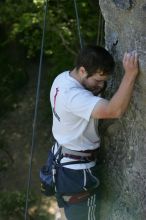 Me top roping Lick the Window (5.10c), shot by Javier Morales from the top of Ack! (5.11b, but using the crack for the start instead) that I top roped up with my camera on my back.  It was another long day of rock climbing at Seismic Wall on Austin's Barton Creek Greenbelt, Sunday, April 5, 2009.

Filename: SRM_20090405_17291658.jpg
Aperture: f/5.6
Shutter Speed: 1/320
Body: Canon EOS-1D Mark II
Lens: Canon EF 80-200mm f/2.8 L