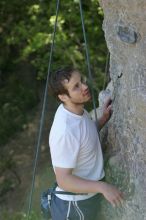 Me top roping Lick the Window (5.10c), shot by Javier Morales from the top of Ack! (5.11b, but using the crack for the start instead) that I top roped up with my camera on my back.  It was another long day of rock climbing at Seismic Wall on Austin's Barton Creek Greenbelt, Sunday, April 5, 2009.

Filename: SRM_20090405_17293863.jpg
Aperture: f/4.5
Shutter Speed: 1/320
Body: Canon EOS-1D Mark II
Lens: Canon EF 80-200mm f/2.8 L