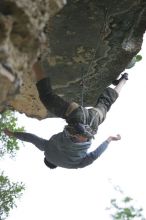 Someone taking a big fall on Cuttin Cards for a Poke (5.12+).  It was another long day of rock climbing at Seismic Wall on Austin's Barton Creek Greenbelt, Saturday, April 11, 2009.

Filename: SRM_20090411_13314956.JPG
Aperture: f/2.8
Shutter Speed: 1/800
Body: Canon EOS-1D Mark II
Lens: Canon EF 80-200mm f/2.8 L