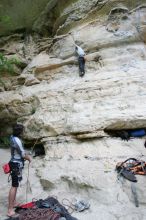 Andrew Dreher lead climbing Magster (5.10a) with Javier Morales belaying.  It was another long day of rock climbing at Seismic Wall on Austin's Barton Creek Greenbelt, Saturday, April 11, 2009.

Filename: SRM_20090411_15311383.JPG
Aperture: f/4.0
Shutter Speed: 1/250
Body: Canon EOS-1D Mark II
Lens: Canon EF 16-35mm f/2.8 L