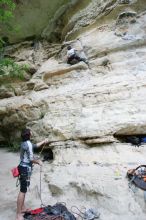 Andrew Dreher lead climbing Magster (5.10a) with Javier Morales belaying.  It was another long day of rock climbing at Seismic Wall on Austin's Barton Creek Greenbelt, Saturday, April 11, 2009.

Filename: SRM_20090411_15320286.JPG
Aperture: f/4.0
Shutter Speed: 1/250
Body: Canon EOS-1D Mark II
Lens: Canon EF 16-35mm f/2.8 L