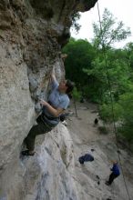 Hannah Norton top rope climbing Diving for Rocks (5.10d), photographed from  the third bolt of Magster (5.10a).  It was another long day of rock climbing at Seismic Wall on Austin's Barton Creek Greenbelt, Saturday, April 11, 2009.

Filename: SRM_20090411_16102845.JPG
Aperture: f/5.0
Shutter Speed: 1/250
Body: Canon EOS-1D Mark II
Lens: Canon EF 16-35mm f/2.8 L