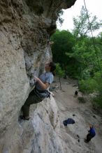 Hannah Norton top rope climbing Diving for Rocks (5.10d), photographed from  the third bolt of Magster (5.10a).  It was another long day of rock climbing at Seismic Wall on Austin's Barton Creek Greenbelt, Saturday, April 11, 2009.

Filename: SRM_20090411_16103049.JPG
Aperture: f/5.0
Shutter Speed: 1/250
Body: Canon EOS-1D Mark II
Lens: Canon EF 16-35mm f/2.8 L