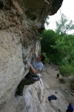 Hannah Norton top rope climbing Diving for Rocks (5.10d), photographed from  the third bolt of Magster (5.10a).  It was another long day of rock climbing at Seismic Wall on Austin's Barton Creek Greenbelt, Saturday, April 11, 2009.

Filename: SRM_20090411_16103153.JPG
Aperture: f/5.0
Shutter Speed: 1/250
Body: Canon EOS-1D Mark II
Lens: Canon EF 16-35mm f/2.8 L