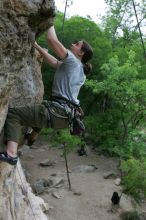 Hannah Norton top rope climbing Diving for Rocks (5.10d), photographed from  the third bolt of Magster (5.10a).  It was another long day of rock climbing at Seismic Wall on Austin's Barton Creek Greenbelt, Saturday, April 11, 2009.

Filename: SRM_20090411_16112259.JPG
Aperture: f/4.0
Shutter Speed: 1/250
Body: Canon EOS-1D Mark II
Lens: Canon EF 16-35mm f/2.8 L