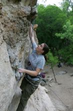 Hannah Norton top rope climbing Diving for Rocks (5.10d), photographed from  the third bolt of Magster (5.10a).  It was another long day of rock climbing at Seismic Wall on Austin's Barton Creek Greenbelt, Saturday, April 11, 2009.

Filename: SRM_20090411_16133364.JPG
Aperture: f/4.0
Shutter Speed: 1/250
Body: Canon EOS-1D Mark II
Lens: Canon EF 16-35mm f/2.8 L