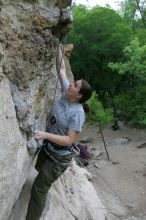 Hannah Norton top rope climbing Diving for Rocks (5.10d), photographed from  the third bolt of Magster (5.10a).  It was another long day of rock climbing at Seismic Wall on Austin's Barton Creek Greenbelt, Saturday, April 11, 2009.

Filename: SRM_20090411_16133365.JPG
Aperture: f/4.0
Shutter Speed: 1/250
Body: Canon EOS-1D Mark II
Lens: Canon EF 16-35mm f/2.8 L