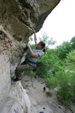 Hannah Norton top rope climbing Diving for Rocks (5.10d), photographed from  the third bolt of Magster (5.10a).  It was another long day of rock climbing at Seismic Wall on Austin's Barton Creek Greenbelt, Saturday, April 11, 2009.

Filename: SRM_20090411_16135579.JPG
Aperture: f/4.0
Shutter Speed: 1/250
Body: Canon EOS-1D Mark II
Lens: Canon EF 16-35mm f/2.8 L