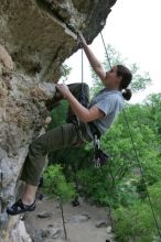 Hannah Norton top rope climbing Diving for Rocks (5.10d), photographed from  the third bolt of Magster (5.10a).  It was another long day of rock climbing at Seismic Wall on Austin's Barton Creek Greenbelt, Saturday, April 11, 2009.

Filename: SRM_20090411_16140580.JPG
Aperture: f/4.0
Shutter Speed: 1/250
Body: Canon EOS-1D Mark II
Lens: Canon EF 16-35mm f/2.8 L