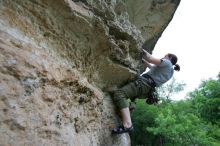 Hannah Norton top rope climbing Diving for Rocks (5.10d), photographed from  the third bolt of Magster (5.10a).  It was another long day of rock climbing at Seismic Wall on Austin's Barton Creek Greenbelt, Saturday, April 11, 2009.

Filename: SRM_20090411_16142484.JPG
Aperture: f/4.0
Shutter Speed: 1/250
Body: Canon EOS-1D Mark II
Lens: Canon EF 16-35mm f/2.8 L