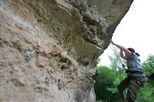 Hannah Norton top rope climbing Diving for Rocks (5.10d), photographed from  the third bolt of Magster (5.10a).  It was another long day of rock climbing at Seismic Wall on Austin's Barton Creek Greenbelt, Saturday, April 11, 2009.

Filename: SRM_20090411_16143787.JPG
Aperture: f/4.0
Shutter Speed: 1/250
Body: Canon EOS-1D Mark II
Lens: Canon EF 16-35mm f/2.8 L