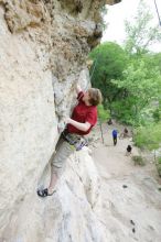 Kirsten Viering top rope climbing Diving for Rocks (5.10d), photographed from  the third bolt of Magster (5.10a).  It was another long day of rock climbing at Seismic Wall on Austin's Barton Creek Greenbelt, Saturday, April 11, 2009.

Filename: SRM_20090411_16191389.JPG
Aperture: f/4.0
Shutter Speed: 1/250
Body: Canon EOS-1D Mark II
Lens: Canon EF 16-35mm f/2.8 L