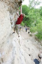 Kirsten Viering top rope climbing Diving for Rocks (5.10d), photographed from  the third bolt of Magster (5.10a).  It was another long day of rock climbing at Seismic Wall on Austin's Barton Creek Greenbelt, Saturday, April 11, 2009.

Filename: SRM_20090411_16191792.JPG
Aperture: f/4.0
Shutter Speed: 1/250
Body: Canon EOS-1D Mark II
Lens: Canon EF 16-35mm f/2.8 L