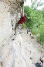 Kirsten Viering top rope climbing Diving for Rocks (5.10d), photographed from  the third bolt of Magster (5.10a).  It was another long day of rock climbing at Seismic Wall on Austin's Barton Creek Greenbelt, Saturday, April 11, 2009.

Filename: SRM_20090411_16191893.JPG
Aperture: f/4.0
Shutter Speed: 1/250
Body: Canon EOS-1D Mark II
Lens: Canon EF 16-35mm f/2.8 L