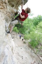 Kirsten Viering top rope climbing Diving for Rocks (5.10d), photographed from  the third bolt of Magster (5.10a).  It was another long day of rock climbing at Seismic Wall on Austin's Barton Creek Greenbelt, Saturday, April 11, 2009.

Filename: SRM_20090411_16192902.JPG
Aperture: f/4.0
Shutter Speed: 1/250
Body: Canon EOS-1D Mark II
Lens: Canon EF 16-35mm f/2.8 L