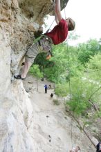 Kirsten Viering top rope climbing Diving for Rocks (5.10d), photographed from  the third bolt of Magster (5.10a).  It was another long day of rock climbing at Seismic Wall on Austin's Barton Creek Greenbelt, Saturday, April 11, 2009.

Filename: SRM_20090411_16193104.JPG
Aperture: f/4.0
Shutter Speed: 1/250
Body: Canon EOS-1D Mark II
Lens: Canon EF 16-35mm f/2.8 L