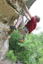 Kirsten Viering top rope climbing Diving for Rocks (5.10d), photographed from  the third bolt of Magster (5.10a).  It was another long day of rock climbing at Seismic Wall on Austin's Barton Creek Greenbelt, Saturday, April 11, 2009.

Filename: SRM_20090411_16194105.JPG
Aperture: f/4.0
Shutter Speed: 1/250
Body: Canon EOS-1D Mark II
Lens: Canon EF 16-35mm f/2.8 L