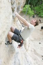 Adam Libson top rope climbing Diving for Rocks (5.10d), photographed from  the third bolt of Magster (5.10a).  It was another long day of rock climbing at Seismic Wall on Austin's Barton Creek Greenbelt, Saturday, April 11, 2009.

Filename: SRM_20090411_16241708.JPG
Aperture: f/4.0
Shutter Speed: 1/250
Body: Canon EOS-1D Mark II
Lens: Canon EF 16-35mm f/2.8 L