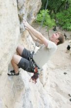 Adam Libson top rope climbing Diving for Rocks (5.10d), photographed from  the third bolt of Magster (5.10a).  It was another long day of rock climbing at Seismic Wall on Austin's Barton Creek Greenbelt, Saturday, April 11, 2009.

Filename: SRM_20090411_16241709.JPG
Aperture: f/4.0
Shutter Speed: 1/250
Body: Canon EOS-1D Mark II
Lens: Canon EF 16-35mm f/2.8 L