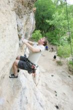 Adam Libson top rope climbing Diving for Rocks (5.10d), photographed from  the third bolt of Magster (5.10a).  It was another long day of rock climbing at Seismic Wall on Austin's Barton Creek Greenbelt, Saturday, April 11, 2009.

Filename: SRM_20090411_16242110.JPG
Aperture: f/4.0
Shutter Speed: 1/250
Body: Canon EOS-1D Mark II
Lens: Canon EF 16-35mm f/2.8 L