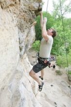 Adam Libson top rope climbing Diving for Rocks (5.10d), photographed from  the third bolt of Magster (5.10a).  It was another long day of rock climbing at Seismic Wall on Austin's Barton Creek Greenbelt, Saturday, April 11, 2009.

Filename: SRM_20090411_16242215.JPG
Aperture: f/4.0
Shutter Speed: 1/250
Body: Canon EOS-1D Mark II
Lens: Canon EF 16-35mm f/2.8 L