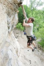 Adam Libson top rope climbing Diving for Rocks (5.10d), photographed from  the third bolt of Magster (5.10a).  It was another long day of rock climbing at Seismic Wall on Austin's Barton Creek Greenbelt, Saturday, April 11, 2009.

Filename: SRM_20090411_16242218.JPG
Aperture: f/4.0
Shutter Speed: 1/250
Body: Canon EOS-1D Mark II
Lens: Canon EF 16-35mm f/2.8 L