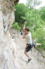 Adam Libson top rope climbing Diving for Rocks (5.10d), photographed from  the third bolt of Magster (5.10a).  It was another long day of rock climbing at Seismic Wall on Austin's Barton Creek Greenbelt, Saturday, April 11, 2009.

Filename: SRM_20090411_16242220.JPG
Aperture: f/4.0
Shutter Speed: 1/250
Body: Canon EOS-1D Mark II
Lens: Canon EF 16-35mm f/2.8 L