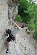 Adam Libson top rope climbing Diving for Rocks (5.10d), photographed from  the third bolt of Magster (5.10a).  It was another long day of rock climbing at Seismic Wall on Austin's Barton Creek Greenbelt, Saturday, April 11, 2009.

Filename: SRM_20090411_16251124.JPG
Aperture: f/5.0
Shutter Speed: 1/400
Body: Canon EOS-1D Mark II
Lens: Canon EF 16-35mm f/2.8 L