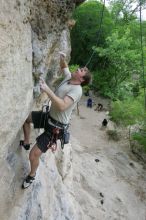 Adam Libson top rope climbing Diving for Rocks (5.10d), photographed from  the third bolt of Magster (5.10a).  It was another long day of rock climbing at Seismic Wall on Austin's Barton Creek Greenbelt, Saturday, April 11, 2009.

Filename: SRM_20090411_16251426.JPG
Aperture: f/5.0
Shutter Speed: 1/400
Body: Canon EOS-1D Mark II
Lens: Canon EF 16-35mm f/2.8 L