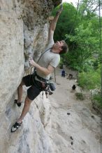 Adam Libson top rope climbing Diving for Rocks (5.10d), photographed from  the third bolt of Magster (5.10a).  It was another long day of rock climbing at Seismic Wall on Austin's Barton Creek Greenbelt, Saturday, April 11, 2009.

Filename: SRM_20090411_16251427.JPG
Aperture: f/5.0
Shutter Speed: 1/400
Body: Canon EOS-1D Mark II
Lens: Canon EF 16-35mm f/2.8 L