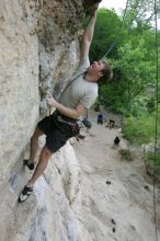 Adam Libson top rope climbing Diving for Rocks (5.10d), photographed from  the third bolt of Magster (5.10a).  It was another long day of rock climbing at Seismic Wall on Austin's Barton Creek Greenbelt, Saturday, April 11, 2009.

Filename: SRM_20090411_16251428.JPG
Aperture: f/5.0
Shutter Speed: 1/400
Body: Canon EOS-1D Mark II
Lens: Canon EF 16-35mm f/2.8 L