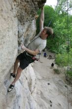 Adam Libson top rope climbing Diving for Rocks (5.10d), photographed from  the third bolt of Magster (5.10a).  It was another long day of rock climbing at Seismic Wall on Austin's Barton Creek Greenbelt, Saturday, April 11, 2009.

Filename: SRM_20090411_16251429.JPG
Aperture: f/5.0
Shutter Speed: 1/400
Body: Canon EOS-1D Mark II
Lens: Canon EF 16-35mm f/2.8 L