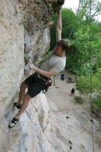 Adam Libson top rope climbing Diving for Rocks (5.10d), photographed from  the third bolt of Magster (5.10a).  It was another long day of rock climbing at Seismic Wall on Austin's Barton Creek Greenbelt, Saturday, April 11, 2009.

Filename: SRM_20090411_16251430.JPG
Aperture: f/5.0
Shutter Speed: 1/400
Body: Canon EOS-1D Mark II
Lens: Canon EF 16-35mm f/2.8 L