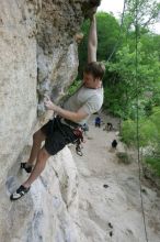 Adam Libson top rope climbing Diving for Rocks (5.10d), photographed from  the third bolt of Magster (5.10a).  It was another long day of rock climbing at Seismic Wall on Austin's Barton Creek Greenbelt, Saturday, April 11, 2009.

Filename: SRM_20090411_16251431.JPG
Aperture: f/5.0
Shutter Speed: 1/400
Body: Canon EOS-1D Mark II
Lens: Canon EF 16-35mm f/2.8 L