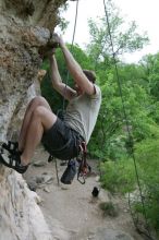 Adam Libson top rope climbing Diving for Rocks (5.10d), photographed from  the third bolt of Magster (5.10a).  It was another long day of rock climbing at Seismic Wall on Austin's Barton Creek Greenbelt, Saturday, April 11, 2009.

Filename: SRM_20090411_16252034.JPG
Aperture: f/5.0
Shutter Speed: 1/400
Body: Canon EOS-1D Mark II
Lens: Canon EF 16-35mm f/2.8 L