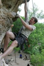 Adam Libson top rope climbing Diving for Rocks (5.10d), photographed from  the third bolt of Magster (5.10a).  It was another long day of rock climbing at Seismic Wall on Austin's Barton Creek Greenbelt, Saturday, April 11, 2009.

Filename: SRM_20090411_16252235.JPG
Aperture: f/5.0
Shutter Speed: 1/400
Body: Canon EOS-1D Mark II
Lens: Canon EF 16-35mm f/2.8 L